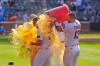 New York Mets' players dump a cooler on Tyrone Taylor, left, after a baseball game against the New York Yankees, Sunday, May 17, 2026, in New York. (AP Photo/Seth Wenig)