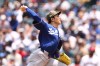 Los Angeles Dodgers pitcher Roki Sasaki throws to a Los Angeles Angels batter during the first inning of a baseball game, Sunday, May 17, 2026, in Anaheim, Calif. (AP Photo/Jessie Alcheh)