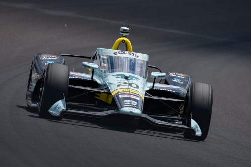 Alexander Rossi drives through the third turn during qualifications for the Indianapolis 500 auto race at the Indianapolis Motor Speedway in Indianapolis, Sunday, May 17, 2026. (AP Photo/Michael Conroy)