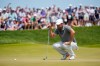 Scottie Scheffler lines up his shot on the seventh green during the final round of the PGA Championship golf tournament at Aronimink Golf Club, Sunday, May 17, 2026, in Newtown Square, PA. (AP Photo/Carolyn Kaster)