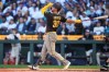 San Diego Padres' Gavin Sheets follows through on a two-run home run against the Seattle Mariners during the sixth inning of a baseball game, Sunday, May 17, 2026, in Seattle. (AP Photo/Lindsey Wasson)