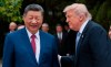 U.S. President Donald Trump, right, speaks with Chinese President Xi Jinping while leaving after a visit to the Zhongnanhai Garden in Beijing, Friday, May 15, 2026. (Evan Vucci/Pool Photo via AP)