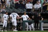 Chicago White Sox's Munetaka Murakami (5) celebrates with manager Will Venable (1) at the dugout after hitting a solo home run during the third inning of a baseball game against the Chicago Cubs in Chicago, Saturday, May 16, 2026. (AP Photo/Paul Beaty)