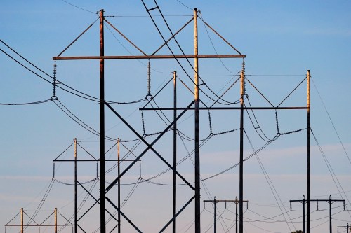 FILE— Central Maine Power utility lines are seen, Wednesday, Oct. 6, 2021, in Pownal, Maine. (AP Photo/Robert F. Bukaty, File)