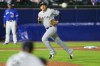 FILE - New York Yankees third baseman Gio Urshela watches his throw to first for the out on Toronto Blue Jays' Bo Bichette during the eighth inning of a baseball game June 16, 2021, in Buffalo, N.Y. (AP Photo/Jeffrey T. Barnes, File)