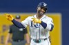 Tampa Bay Rays' Yandy Díaz reacts after hitting a double off Baltimore Orioles pitcher Trevor Rogers during the first inning of a baseball game Monday, May 18, 2026, in St. Petersburg, Fla. (AP Photo/Chris O'Meara)