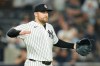 New York Yankees pitcher David Bednar reacts after the last out of a baseball game against the Toronto Blue Jays, Monday, May 18, 2026, in New York. (AP Photo/Seth Wenig)