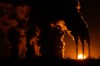 FILE - The Jeffrey Energy Center coal-fired power plant operates at sunset near Emmett, Kan., Jan. 3, 2026, in Topeka, Kan. (AP Photo/Charlie Riedel, file)