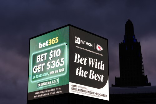 FILE — Advertisements for sports betting apps are seen in downtown Kansas City, Mo., Nov. 29, 2025. (AP Photo/Charlie Riedel, File)