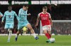 Arsenal's Leandro Trossard passes the ball in front of Burnley's Zeki Amdouni during a Premier League soccer match between Arsenal and Burnley in London, Monday, May 18, 2026. (AP Photo/Kirsty Wigglesworth)