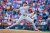 Cincinnati Reds pitcher Chase Burns delivers during the second inning of a baseball game against the Philadelphia Phillies, Tuesday, May 19, 2026, in Philadelphia. (AP Photo/Chris Szagola)