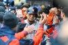 Houston Astros' Isaac Paredes celebrates in the dugout after hitting a two-run home run against the Minnesota Twins during the first inning of a baseball game Tuesday, May 19, 2026, in Minneapolis. (AP Photo/Craig Lassig)