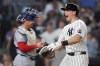 New York Yankees' Ben Rice reacts at home plate after hitting a two-run home run during the fifth inning of a baseball game against the Toronto Blue Jays, Tuesday, May 19, 2026, in New York. (AP Photo/Heather Khalifa)