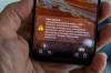 The phone shows the received message 