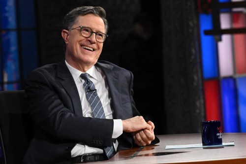 This image released by CBS shows host Stephen Colbert on the set of 