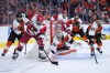 Carolina Hurricanes' William Carrier (28) tries to get the puck past Philadelphia Flyers' Dan Vladar (80), Trevor Zegras (46) and Jamie Drysdale (9) during the third period of Game 4 in a second-round NHL hockey Stanley Cup playoff series Saturday, May 9, 2026, in Philadelphia. (AP Photo/Matt Slocum)