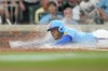 Atlanta Braves' José Azócar slides into home in the fifth inning of a baseball game against the Boston Red Sox Saturday, May 16, 2026, in Atlanta. (AP Photo/Brynn Anderson)