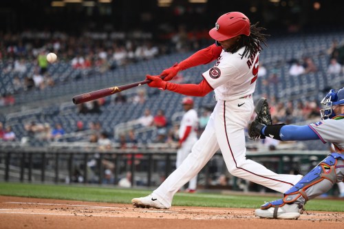 Washington Nationals' CJ Abrams hits a three-run home run during the first inning of a baseball game against the New York Mets, Wednesday, May 20, 2026, in Washington. (AP Photo/Nick Wass)