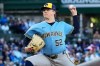 Milwaukee Brewers starting pitcher Kyle Harrison throws against the Chicago Cubs during the first inning of a baseball game in Chicago, Wednesday, May 20, 2026. (AP Photo/Nam Y. Huh)