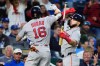Boston Red Sox's Jarren Duran (16) celebrates with Wilyer Abreu after hitting a two-run home run during the seventh inning of a baseball game against the Kansas City Royals, Wednesday, May 20, 2026, in Kansas City, Mo. (AP Photo/Charlie Riedel)