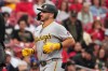 Pittsburgh Pirates' Spencer Horwitz arrives home after hitting a solo home run during the second inning of a baseball game against St. Louis Cardinals Wednesday, May 20, 2026, in St. Louis. (AP Photo/Jeff Roberson)