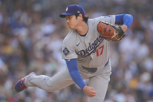 Los Angeles Dodgers starting pitcher Shohei Ohtani works against a San Diego Padres batter during the first inning of a baseball game Wednesday, May 20, 2026, in San Diego. (AP Photo/Gregory Bull)