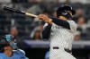 New York Yankees' Trent Grisham hits a double during the second inning of a baseball game against the Toronto Blue Jays, Wednesday, May 20, 2026, in New York. (AP Photo/Yuki Iwamura)
