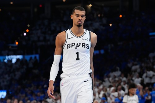 San Antonio Spurs forward Victor Wembanyama reacts after Game 2 in the Western Conference finals NBA basketball playoffs series against the Oklahoma City Thunder Wednesday, May 20, 2026, in Oklahoma City. (AP Photo/Tony Gutierrez)