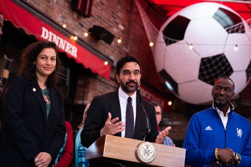 New York Mayor Zohran Mamdani, alongside NYC World Cup Czar Maya Handa, NYC World Cup Czar, left, and New York council member Yusef Salaam, makes a World Cup soccer tournament announcement at Harlem Tavern, Thursday, May 21, 2026 in New York. (AP Photo/Adam Gray)