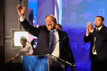FILE - Israeli far-right lawmaker Itamar Ben-Gvir gestures after election exit poll results are released at his party's headquarters in Jerusalem on Nov. 2, 2022. (AP Photo/Oren Ziv, File)
