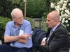 Howard Fendrich, left, Associated Press national sports writer, interviews former French tennis player Guy Forget at the 2019 French Open tennis tournament in Paris. (AP Photo/Andrew Dampf)