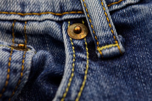 Detail of a pair of worn blue jeans in Phoenix, May 11, 2026. (AP Photo/Dario Lopez-Mills)