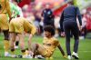 Crystal Palace's Chris Richards, bottom, reacts after after going down with an injury during the Premier League soccer match between Brentford and Crystal Palace, Sunday, May 17, 2026, in London. (John Walton/PA via AP)