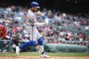 New York Mets' Bo Bichette drives in two runs with a single during the third inning of a baseball game against the Washington Nationals, Thursday, May 21, 2026, in Washington. (AP Photo/Nick Wass)
