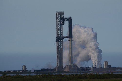 SpaceX's mega rocket Starship is prepared for a test flight that was later delayed, in Starbase, Texas, Thursday, May 21, 2026. (AP Photo/Eric Gay)
