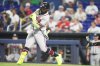 Atlanta Braves' Michael Harris II hits a two run home run during the first inning of a baseball game against the Miami Marlins, Thursday, May 21, 2026, in Miami. (AP Photo/Lynne Sladky)