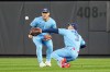 Toronto Blue Jays outfielders Myles Straw (3), catches a fly ball by New York Yankees J.C. Escarra during the third inning of a baseball game, Thursday, May 21, 2026. in New York. (AP Photo/Eduardo Munoz Alvarez)