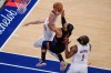 New York Knicks guard Josh Hart (3) is blocked by Cleveland Cavaliers guard Sam Merrill (5) during the second half of Game 2 in the Eastern Conference finals NBA basketball playoffs series, Thursday, May 21, 2026, in New York. (AP Photo/Yuki Iwamura)