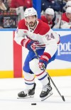 Montreal Canadiens centre Phillip Danault (24) plays against the Lightning in Tampa, Fla., on Sunday, Dec. 28, 2025. (AP Photo/Chris O'Meara)