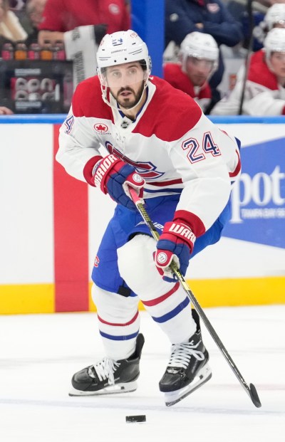 Montreal Canadiens centre Phillip Danault (24) plays against the Lightning in Tampa, Fla., on Sunday, Dec. 28, 2025. (AP Photo/Chris O'Meara)
