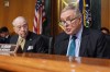 FILE - Sen. Dick Durbin, D-Ill., speaks as Chairman of the Senate Judiciary Committee, Sen. Chuck Grassley, R-Iowa, listens during an oversight hearing at the Capitol in Washington, Tuesday, March 3, 2026. (AP Photo/J. Scott Applewhite, File)