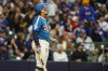 Milwaukee Brewers' William Contreras watches his three-run home run during the first inning of a baseball game against the Los Angeles Dodgers, Friday, May 22, 2026, in Milwaukee. (AP Photo/Jeffrey Phelps)