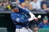 Seattle Mariners' Mitch Garver hits a two-run home run during the seventh inning of a baseball game against the Kansas City Royals, Friday, May 22, 2026, in Kansas City, Mo. (AP Photo/Charlie Riedel)