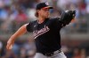 Washington Nationals pitcher Jake Irvin works in the first inning of a baseball game against the Atlanta Braves, Saturday, May 23, 2026, in Atlanta. (AP Photo/Mike Stewart)