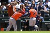 Houston Astros' Christian Walker (8) celebrates with manager Jose Espada, second from left, Christian Vazquez (2) and hitting coach Victor Rodriguez, right, after hitting a two-run home run during the first inning of a baseball game against the Chicago Cubs in Chicago, Saturday, May 23, 2026. (AP Photo/Paul Beaty)