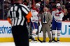 Montreal Canadiens head coach Martin St. Louis, second right, waits for a call following the second period in Raleigh, N.C., on Saturday, May 23, 2026. (AP Photo/Karl DeBlaker)