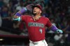 Arizona Diamondbacks' Ketel Marte reacts after hitting a solo home run against the Colorado Rockies in the fourth inning of a baseball game, Saturday, May 23, 2026, in Phoenix. (AP Photo/Rick Scuteri)
