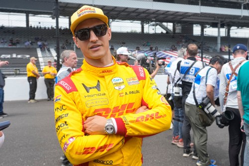 Alex Palou, of Spain, pauses during a photo session before practice for the Indianapolis 500 auto race at the Indianapolis Motor Speedway in Indianapolis, Monday, May 18, 2026. (AP Photo/Michael Conroy)
