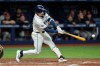 Tampa Bay Rays' Jonny DeLuca lines a two-run double off Baltimore Orioles pitcher Trevor Rogers during the second inning of a baseball game Monday, May 18, 2026, in St. Petersburg, Fla. (AP Photo/Chris O'Meara)