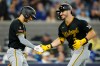 Pittsburgh Pirates first baseman Spencer Horwitz, right, is congratulated by teammate Brandon Lowe after he hit a leadoff home run on the first pitch of the game against the Toronto Blue Jays in Toronto on Sunday, May 24, 2026. THE CANADIAN PRESS/Frank Gunn